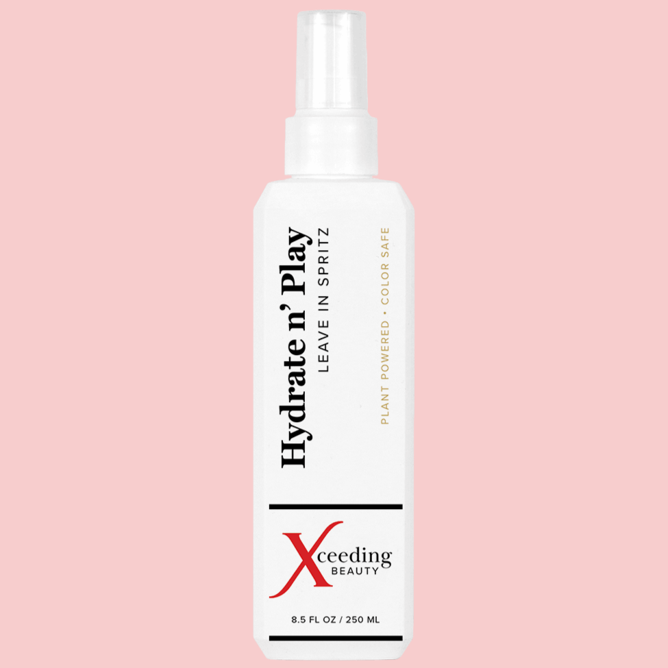 Achieve frizz-free, shiny hair effortlessly with Xceeding Beauty's Hydrate n' Play Leave In Spritz. Protects, nourishes, and detangles for vibrant locks.